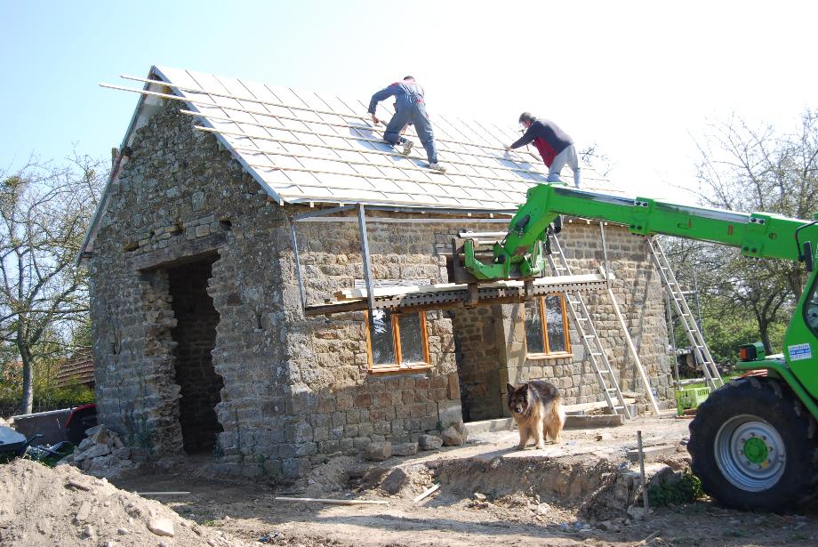 The tough jobs were breaking through the 14 inch stone walls then trying to patch them up again to look smooth, but with a little help from a friend it was done